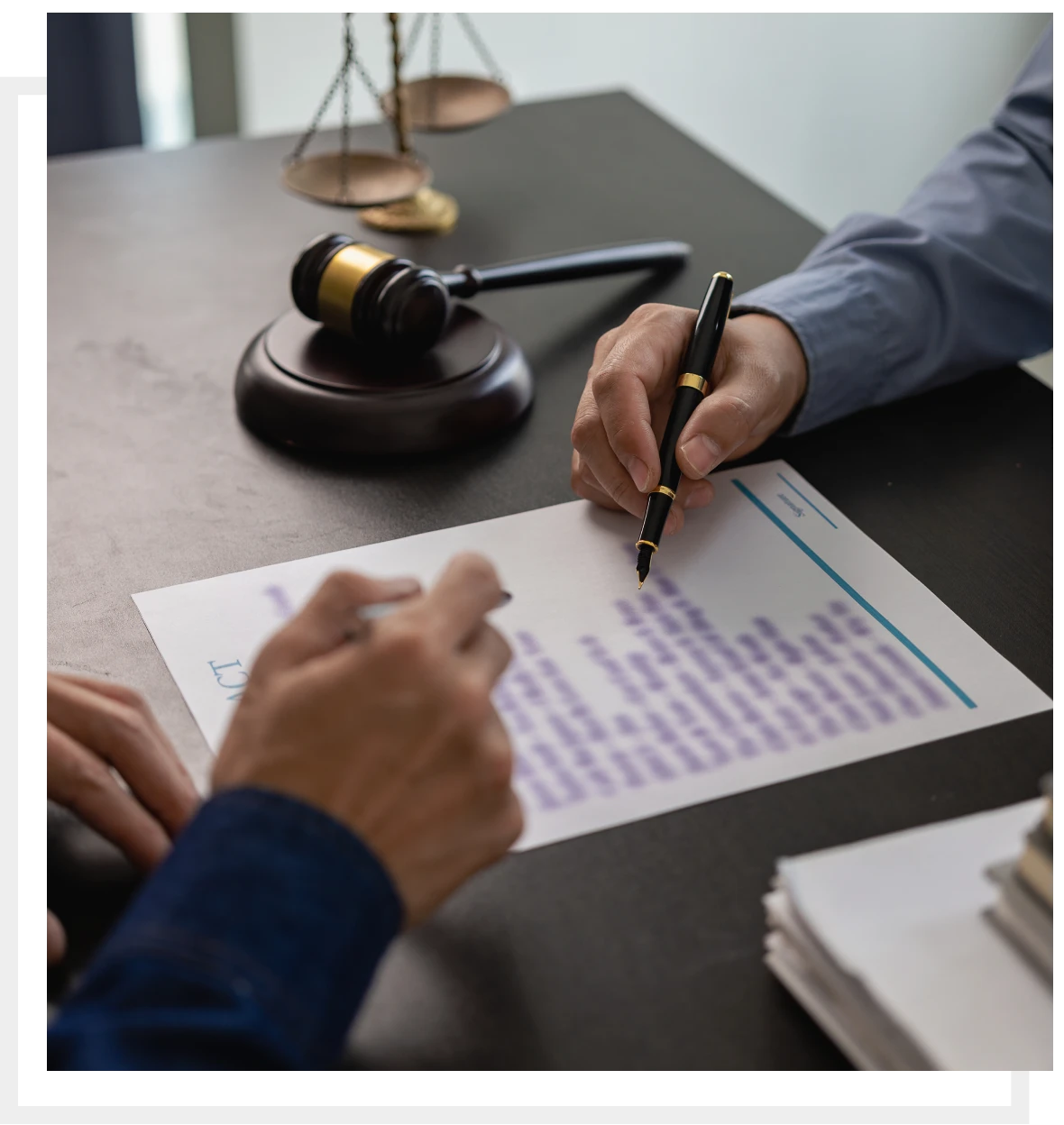 Signing legal documents in an office